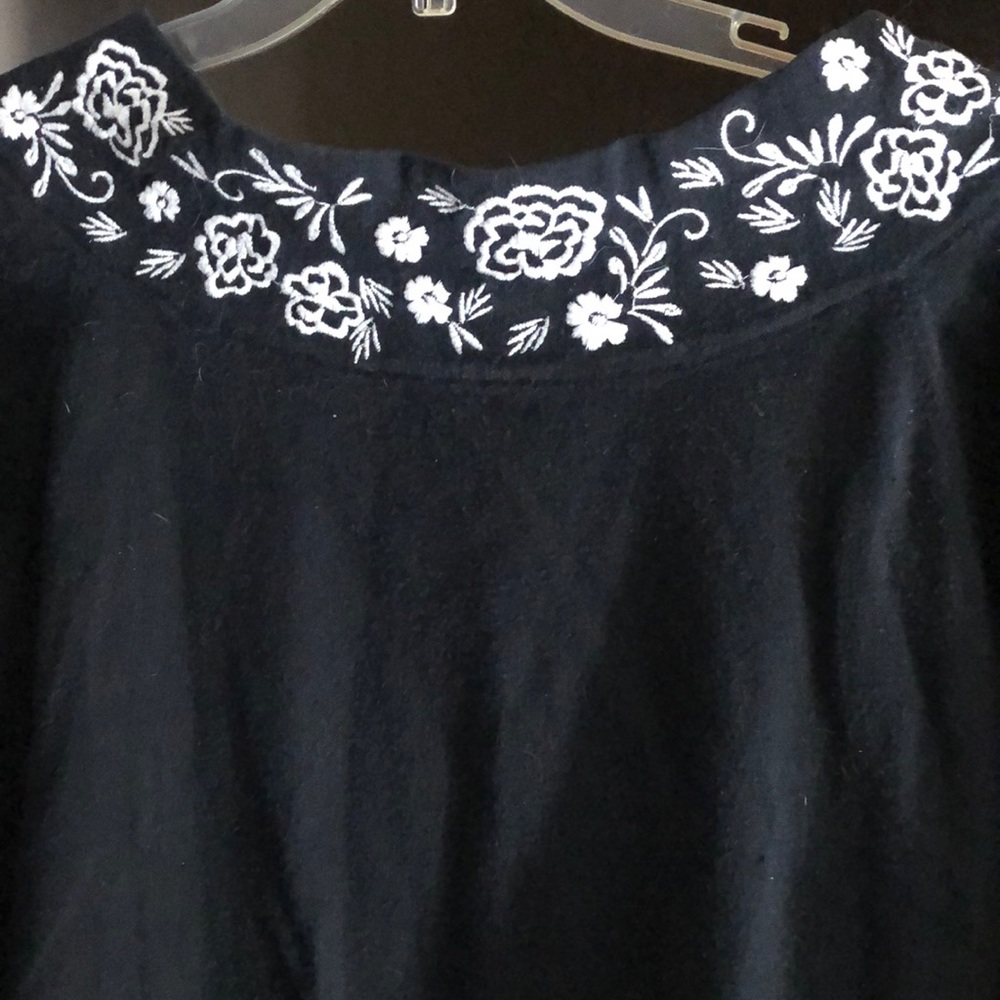Christopher & Banks black women’s top with white embroidered neck and sleeves. L